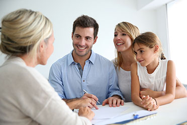 Unmarried couple consulting lawyer for essential estate planning advice in California